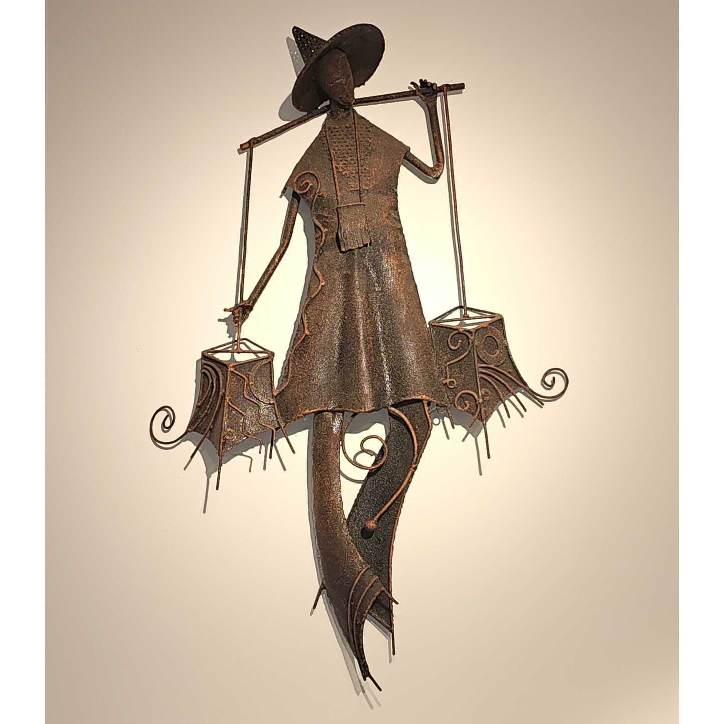 Metal sculpture of a Fulani herder at Afrahouse African Art