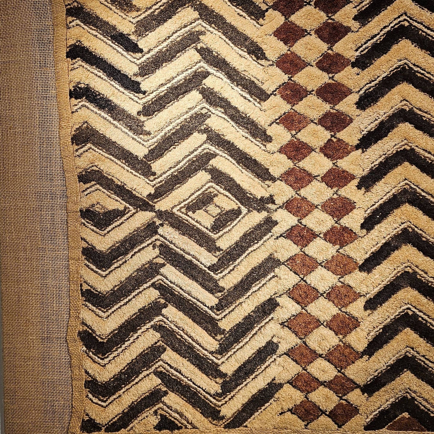 Close - up of a textured fabric with geometric pattern - AfrahouseAfrican Art