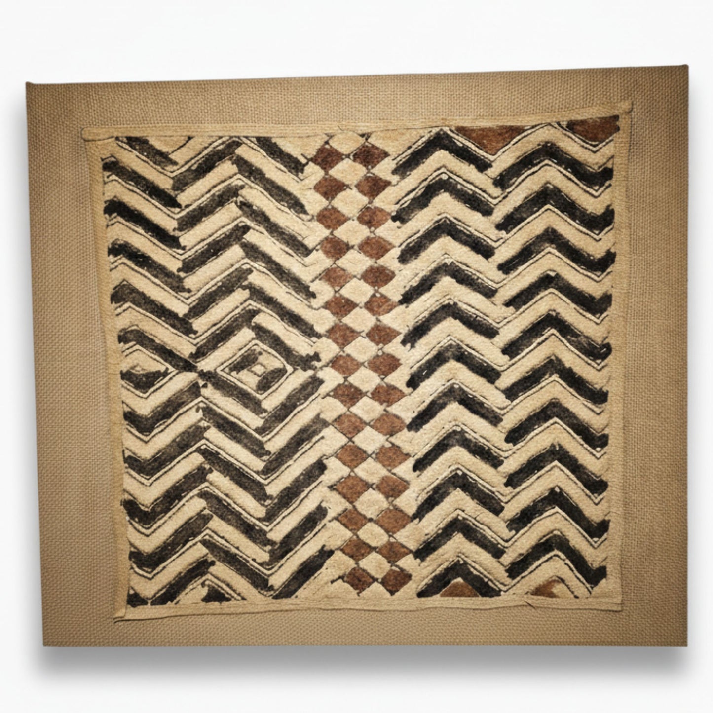 Textile with geometric pattern on a beige background